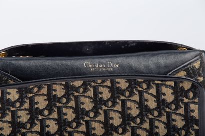 null CHRISTIAN DIOR. 

Clutch bag in black leather and black and beige fabric with...