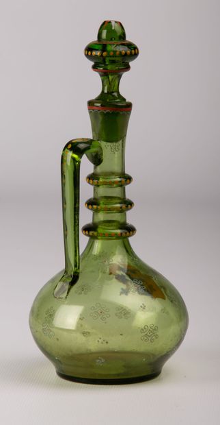 null Covered bottle in green glass, with polychrome decoration of armorial bearings.

Probably...