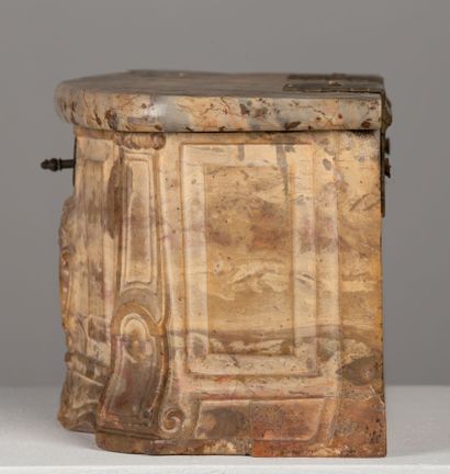 null A richly carved marble viscera box, decorated in front with a crowned coat of...