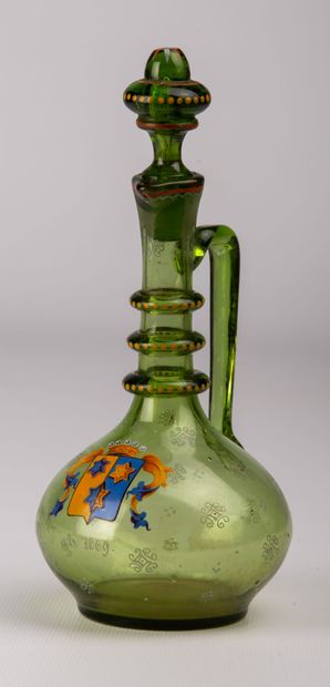 null Covered bottle in green glass, with polychrome decoration of armorial bearings.

Probably...