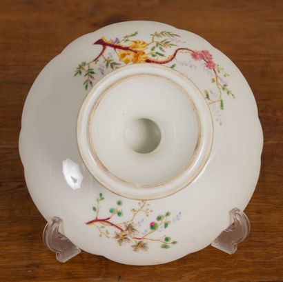 null Part of porcelain service with decoration of flowering branches including: 

28...