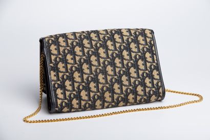 null CHRISTIAN DIOR. 

Clutch bag in black leather and black and beige fabric with...