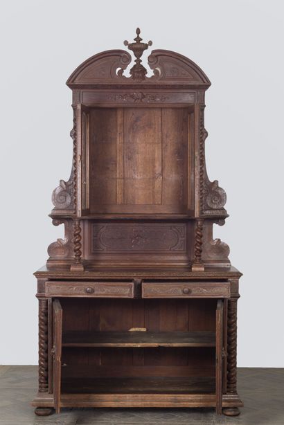 null Buffet with two bodies in molded and carved wood, the upper part glazed. 

The...
