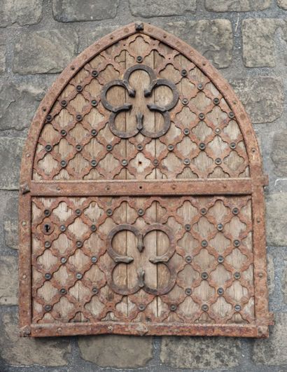 null Wrought iron door with wooden panels. 

The reverse of the lock marked "ST".

H_80...
