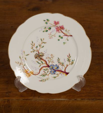 null Part of porcelain service with decoration of flowering branches including: 

28...
