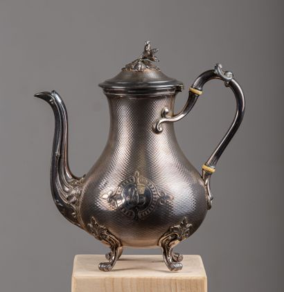 null Silver teapot with guilloche decoration and monogrammed JC in a cartouche. 

The...