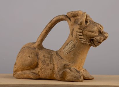 
Rhyton representing an animal, in earth.




Persia,...