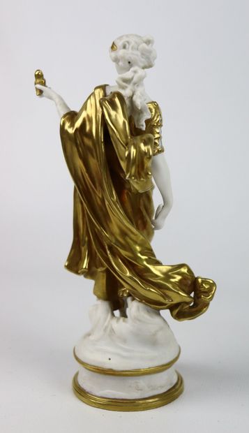 null CAPODIMONTE.

Vestal in white and gold porcelain, holding a bird in her hand....