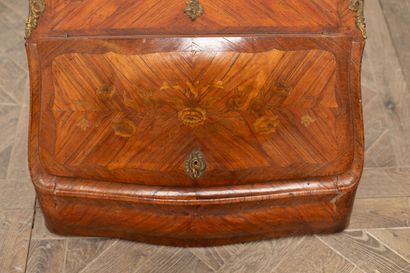 null Secretary slope marquetry and veneer with floral decoration.

A flap reveals...