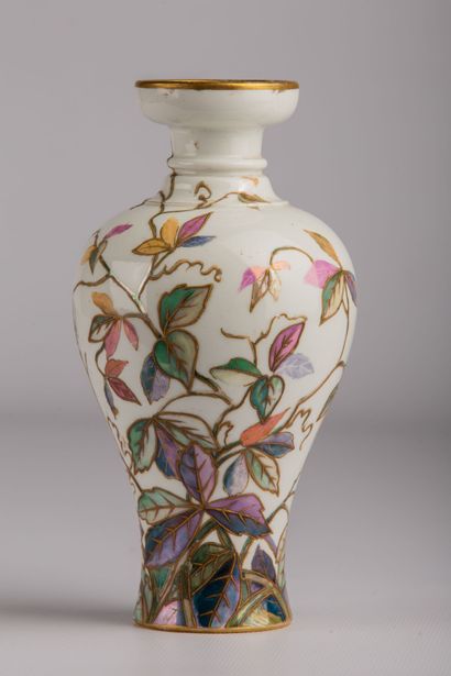 null SEVRES. 

Small vase of baluster form out of porcelain with polychrome decoration...