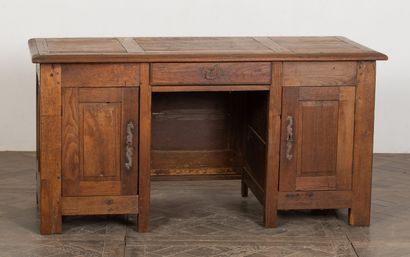 null Oak chest transformed into a desk, decorated with pilasters, palms and angel...