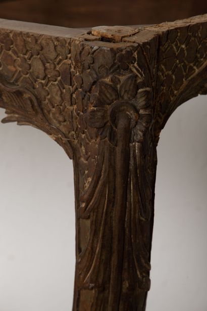 null Unusually low console in carved and openwork wood, formerly lacquered or gilded.

The...