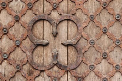 null Wrought iron door with wooden panels. 

The reverse of the lock marked "ST".

H_80...