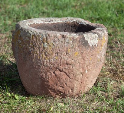 null Mortar in pink sandstone with archaic man's head decoration.

Probably from...