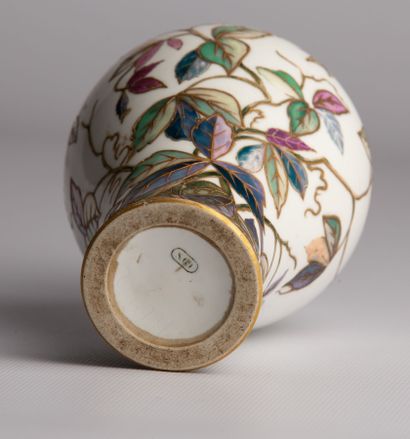 null SEVRES. 

Small vase of baluster form out of porcelain with polychrome decoration...