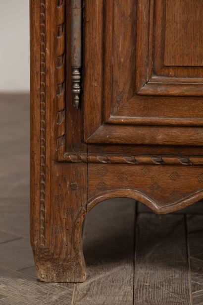 null 
Norman sideboard with two bodies in molded and carved oak, decorated with a...