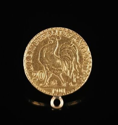 null Coin of 20 francs gold Marianne mounted in pendant.

1901.

6.54 grams