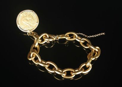 null Bracelet with mesh forçat in yellow gold, set with a coin of 20 francs gold...
