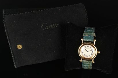 null CARTIER, Paris.

Yellow gold ladies' wristwatch, decorated with five sapphire...