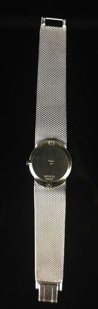 null PIAGET.

Lady's wristwatch in white gold, the bezel paved with diamonds.

Index...