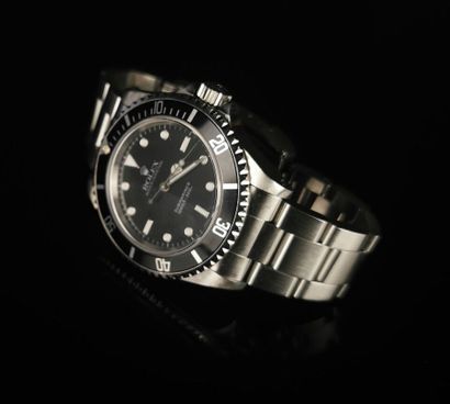 null 
ROLEX.




Submariner, ref 14060M.




Men's diving wristwatch in steel with...