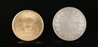 null 20 dollar Liberty gold coin, 1889.

33.44 grams.

Attached is a 5 franc Louis...