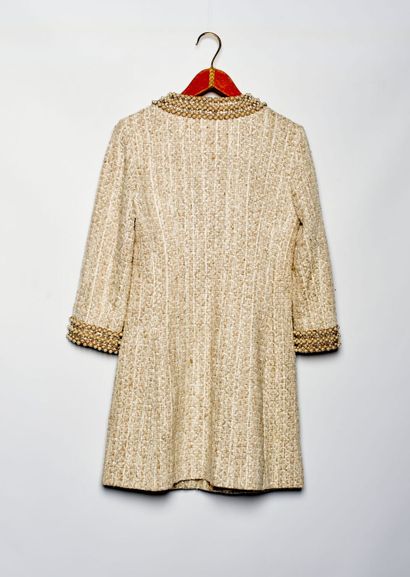 null ANDREW GN - Printemps-été 2005.

Manteau en tweed de lin, laine et soie beige...