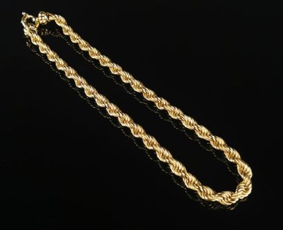 null Collier en or jaune à maille tressée et à motifs alternés, le fermoir en forme...