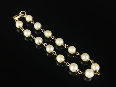 null Bracelet en or jaune et perles de culture.
L_20 cm.
Poids brut : 11,58 grammes,...