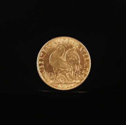 Pièce de 10 francs Marianne et coq en or.
1912.
3,22...