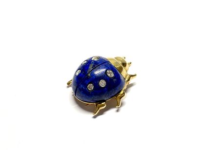 null CARTIER, Paris.
Ladybug lapel clip with folded wings in yellow gold and lapis...