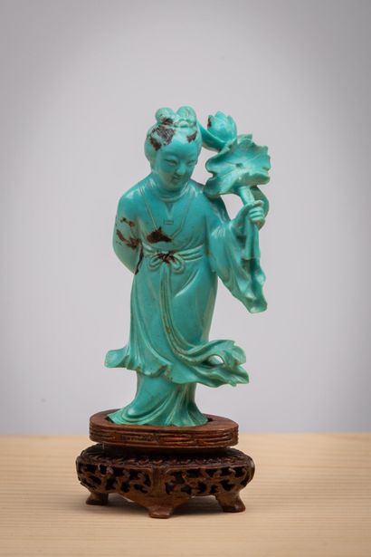 CHINE, XXème siècle.
Statuette en turquoise...