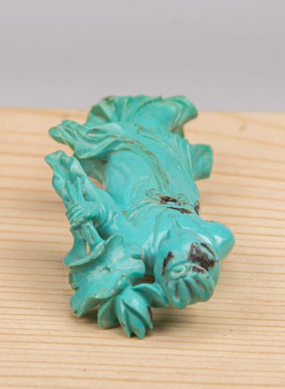 null CHINE, XXème siècle.
Statuette en turquoise sculptée à décor de déesse de Printemps.
H_7,5...