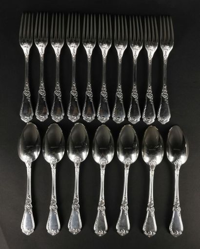 null Seven large spoons and ten large table forks in silver with rocaille decoration....