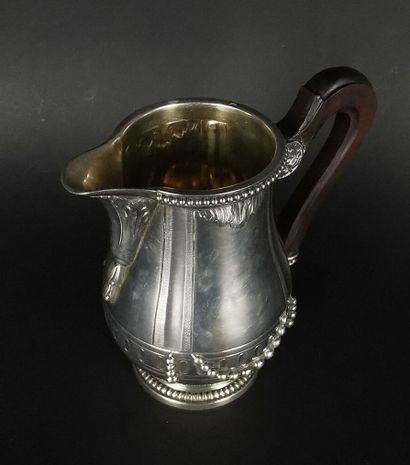 null PUIFORCAT.
Silver tea and coffee service on pedestal decorated with a frieze...