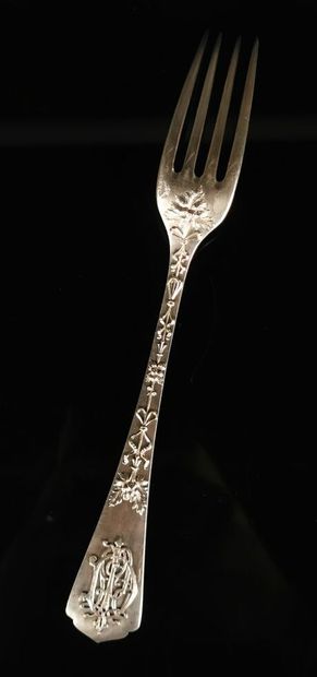 null CARDEILHAC.
Suite of seven silver forks richly decorated with garlands of knotted...
