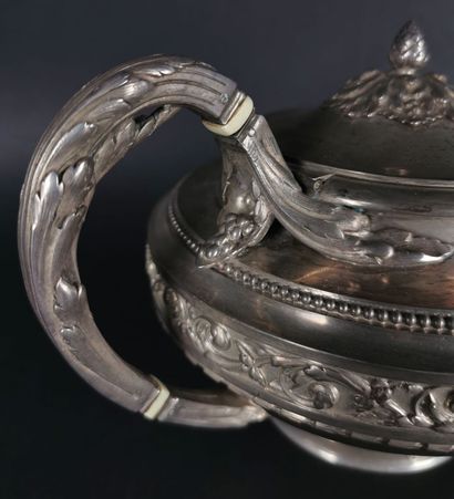 null FROMENT- MEURICE.
Silver tea and coffee service on pedestal, decorated with...