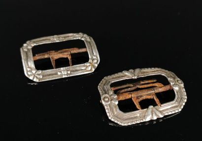 null Two 18th century silver belt buckles, metal pins.
Probably hallmark of charge...