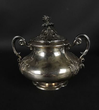 null Coffee pot and its covered sugar bowl in silver with rich plant decoration....