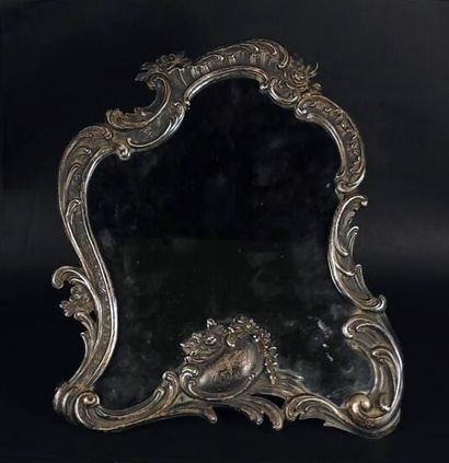 Silver table mirror with rocaille decoration.
Alphonse...