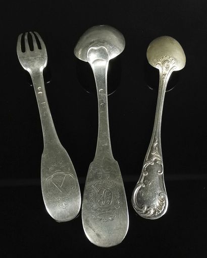 null Silver set including: an 18th century fork with a coat of arms, a 19th century...