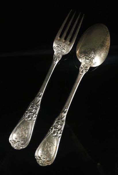 null Twelve large silver cutlery with rocaille decoration, figured model.
Louis XV...