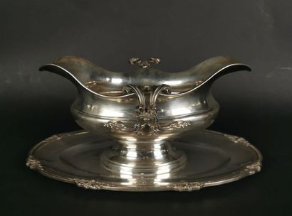 null CARDEILHAC.
Sauceboat with a silver plate decorated with acanthus leaves, engraved...