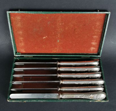 null Suite of six fruit knives, the handles in silver with the arms of the Baron...