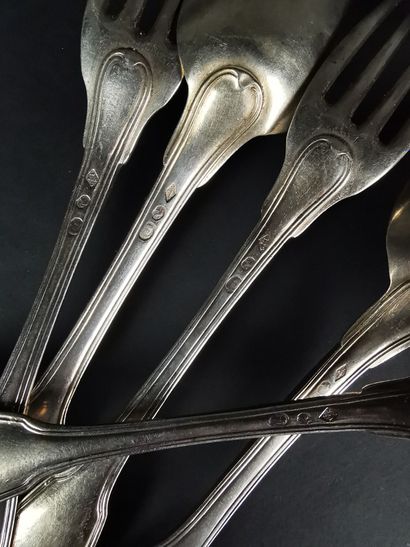 null Set of eight silver cutlery, filet model, mismatched.
19th century.
1190.45...