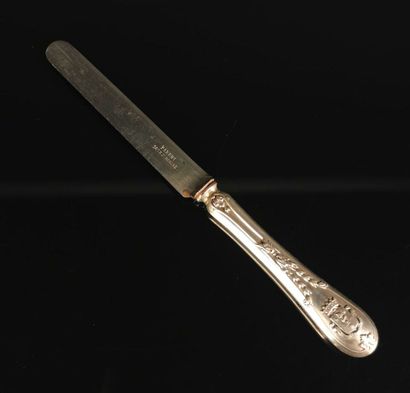 null Suite of six fruit knives, the handles in silver with the arms of the Baron...