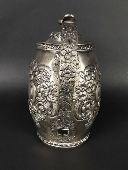 null Silver coffee pot with embossed and chased decoration of flowers, scrolls and...