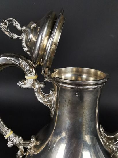 null Coffee pot with four feet in silver decorated with acanthus leaf.
Louis XV style.
Goldsmith...