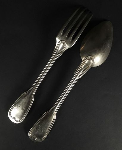 null Set of eight silver cutlery, filet model, mismatched.
19th century.
1190.45...