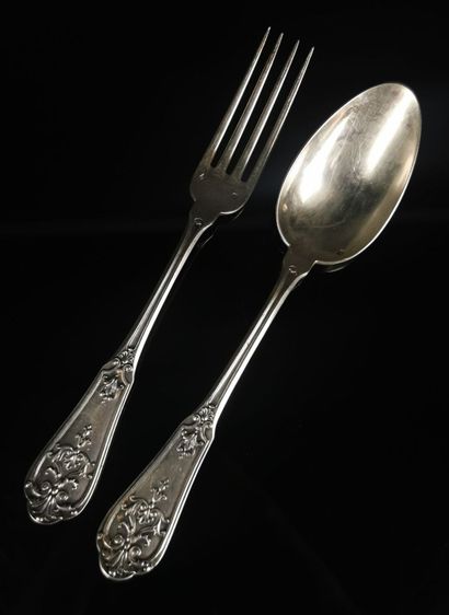 null Twelve large silver cutlery with rocaille decoration, figured model.
Louis XV...